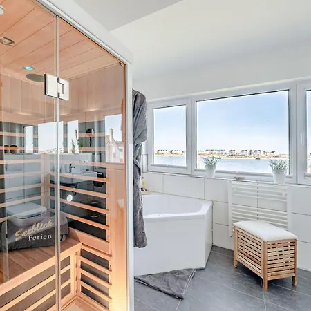別荘 Ferienhaus-am-meer-by-seeblick-ferien-oro-direkte-wasserlage-sauna-kamin オルペニッツ