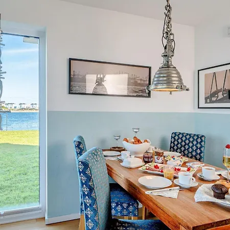 Nyaraló Ferienhaus-am-meer-by-seeblick-ferien-oro-direkte-wasserlage-sauna-kamin *